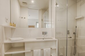 Shower, free toiletries, hair dryer, towels
