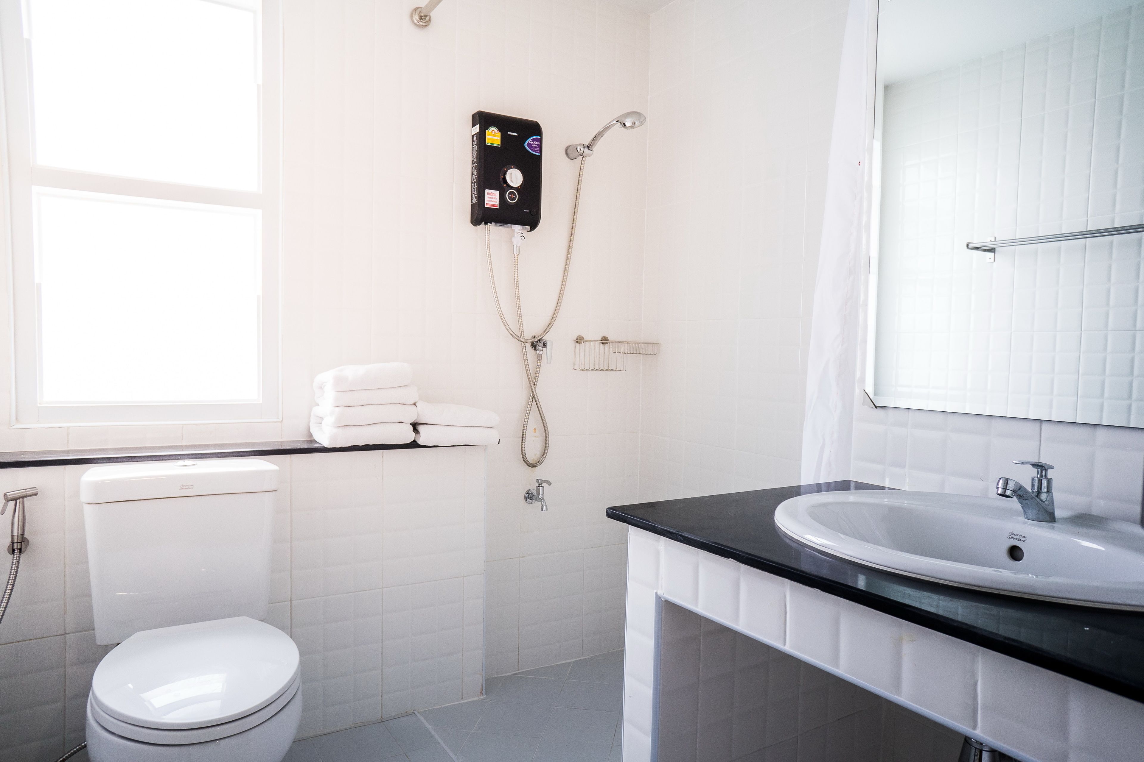 shower, free toiletries, hair dryer, towels