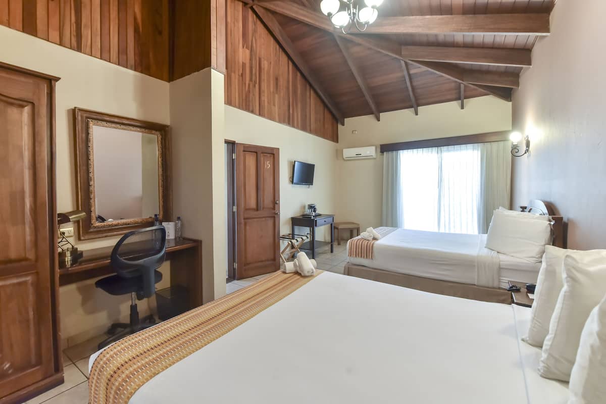 superior quadruple room, 2 queen beds | 1 bedroom, in-room safe, laptop workspace, blackout curtains