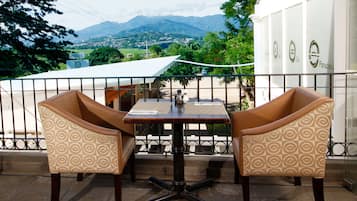 Breakfast, lunch, dinner served; Fusion cuisine, garden views