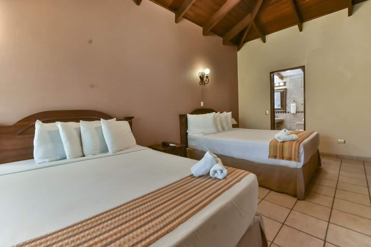 superior quadruple room, 2 queen beds | 1 bedroom, in-room safe, laptop workspace, blackout curtains