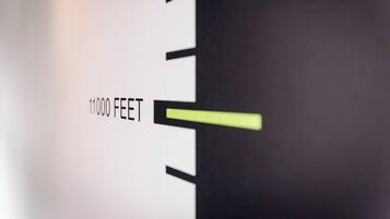 A scale with '11000 FEET' marked on it.