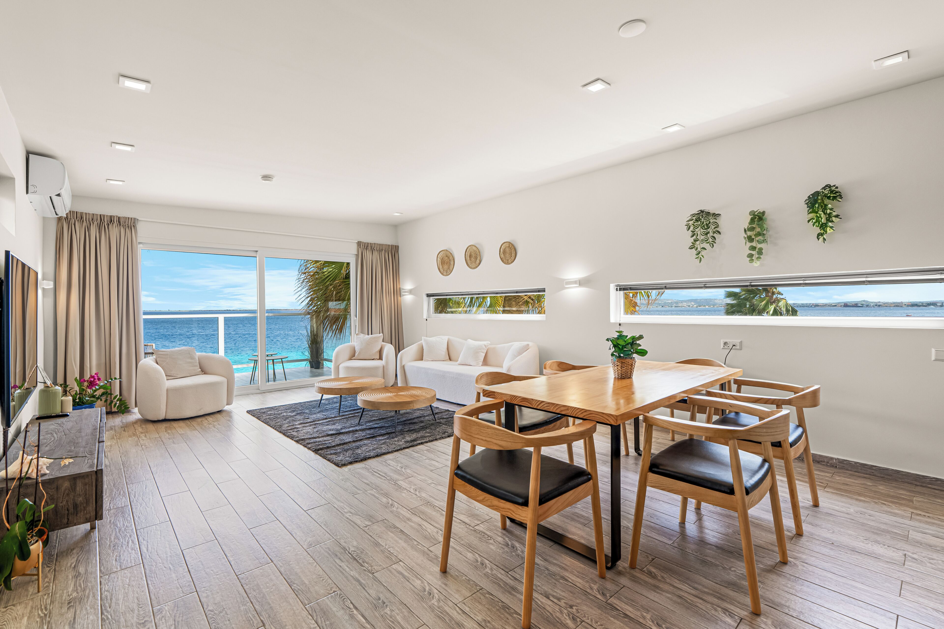 penthouse, sea view | living area | 43-inch smart tv with digital channels, netflix, books