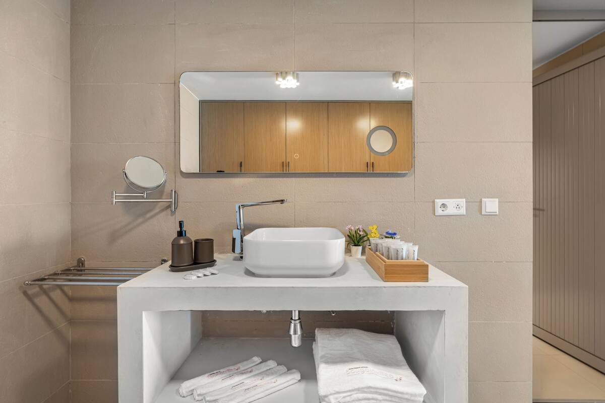 deluxe quadruple room | 1 bedroom, premium bedding, in-room safe, blackout curtains