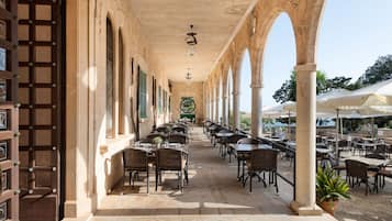 Breakfast, lunch, dinner served; Mediterranean cuisine, sea views