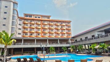 Outdoor pool, pool umbrellas, sun loungers