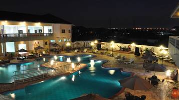 Outdoor pool, pool umbrellas, sun loungers