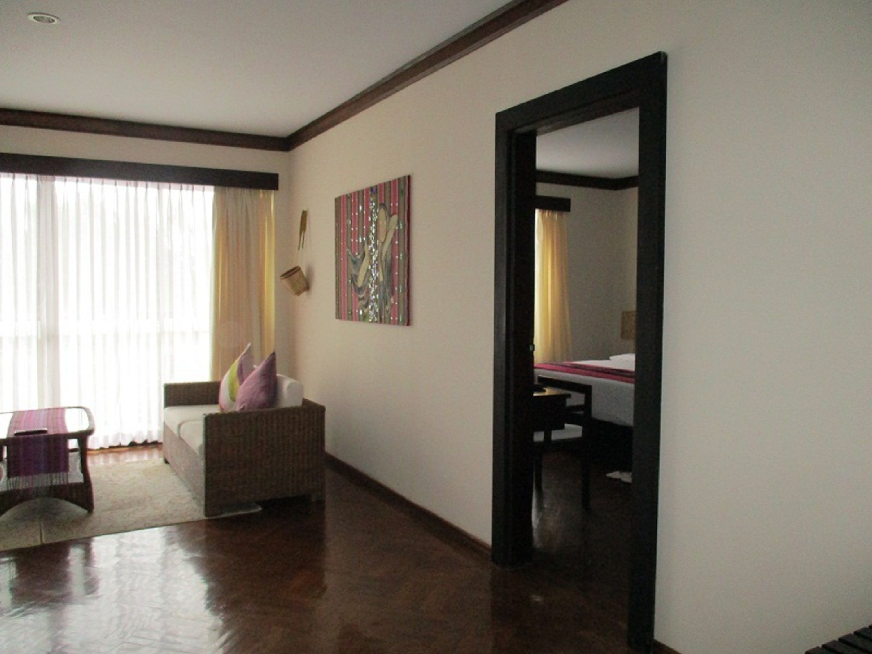 deluxe suite, 2 bedrooms | living area | 24-inch lcd tv with satellite channels, tv