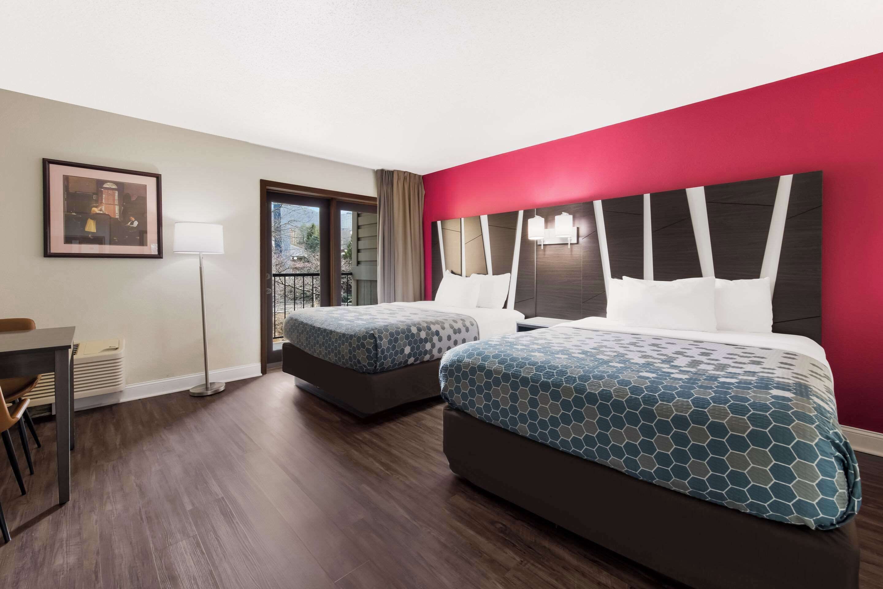 standard room, 2 queen beds, patio, river view | premium bedding, in-room safe, desk, laptop workspace