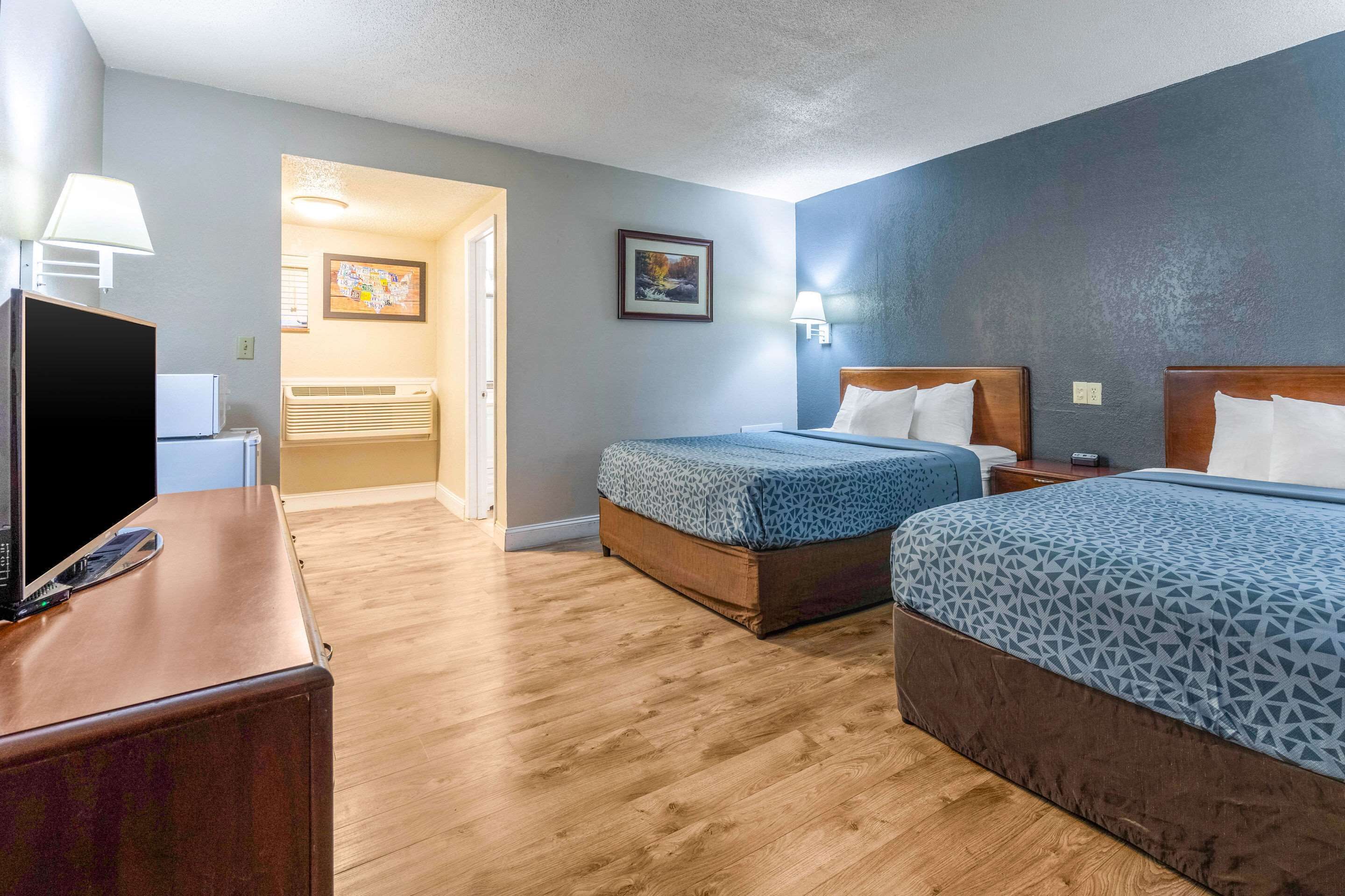 standard room, 2 queen beds, patio, river view | premium bedding, in-room safe, desk, laptop workspace