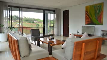 4 Bedrooms Villa with Private Pool | Living area | 40-inch flat-screen TV with digital channels, plasma TV, DVD player