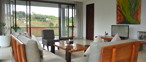 4 Bedrooms Villa with Private Pool | Living area | 40-inch flat-screen TV with digital channels, plasma TV, DVD player