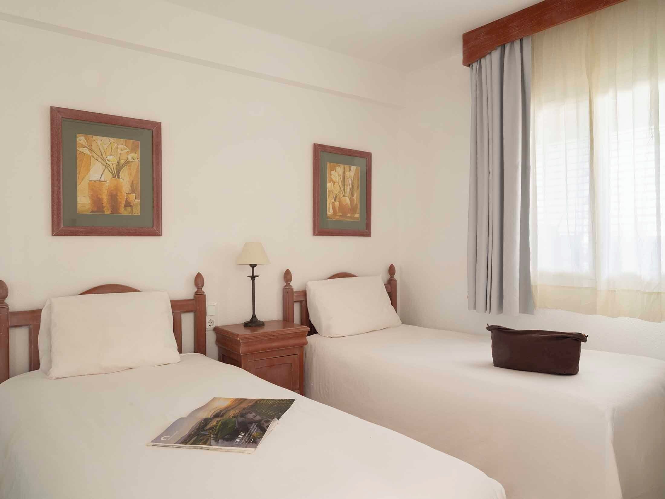 In-room safe, desk, iron/ironing board, cribs (surcharge)