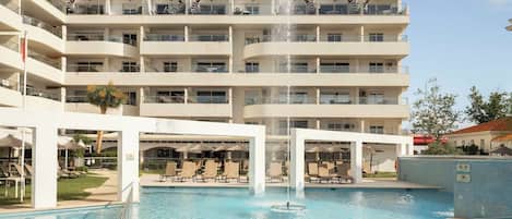 Seasonal outdoor pool, pool umbrellas, pool loungers