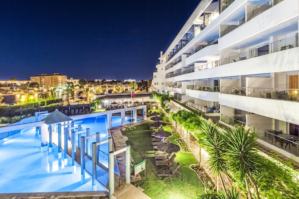 Seasonal outdoor pool, pool umbrellas, sun loungers