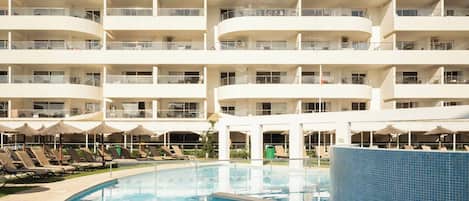 Seasonal outdoor pool, pool umbrellas, pool loungers
