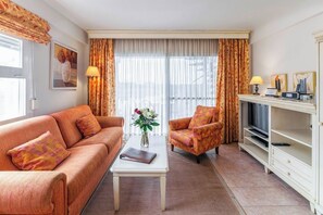 Télévision à écran plat, lecteur de DVD