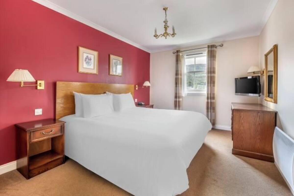 Iron/ironing board, cribs (free), WiFi (free), bed sheets
