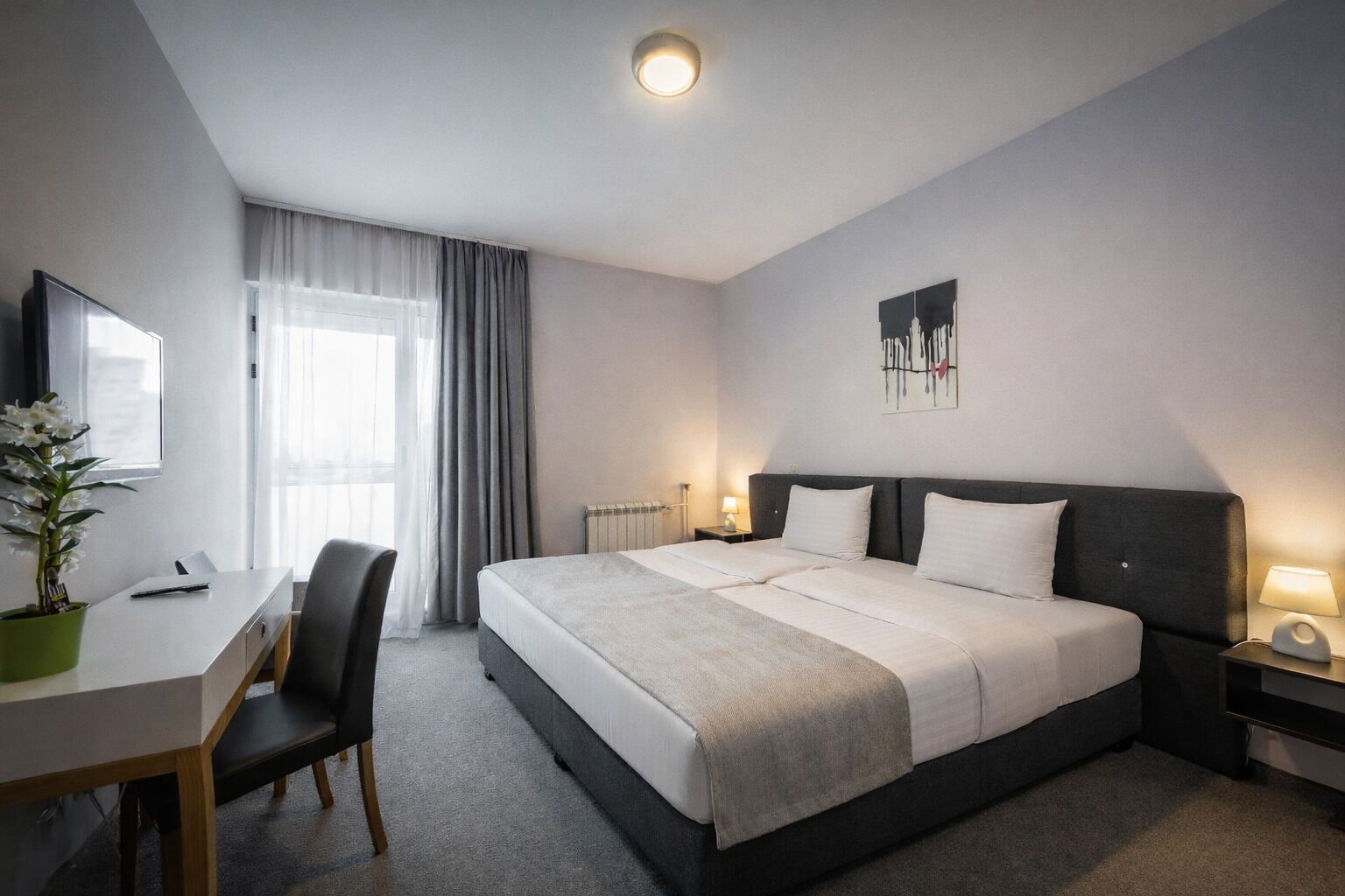 Standard Double or Twin Room | Minibar, in-room safe, desk, blackout curtains