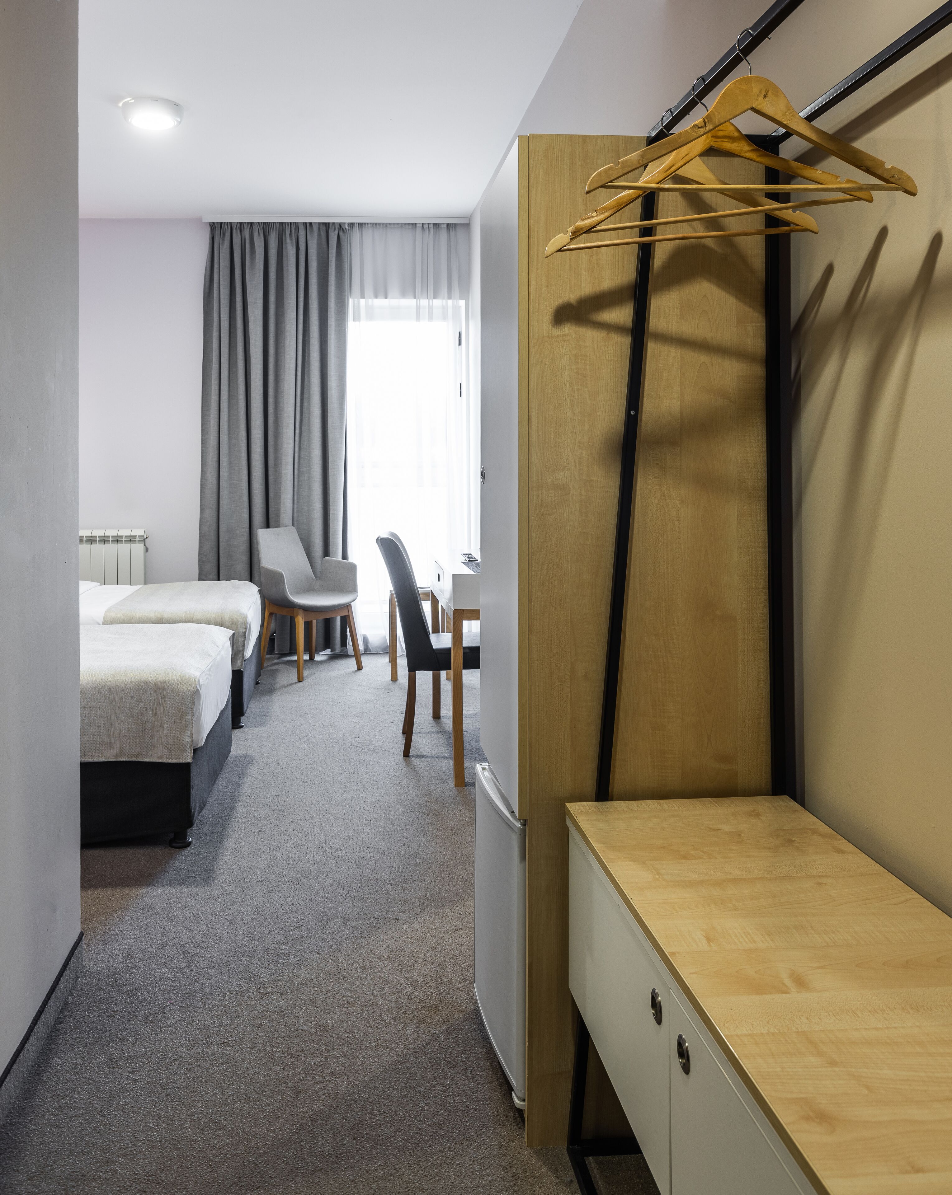 standard double or twin room | minibar, in-room safe, desk, blackout curtains