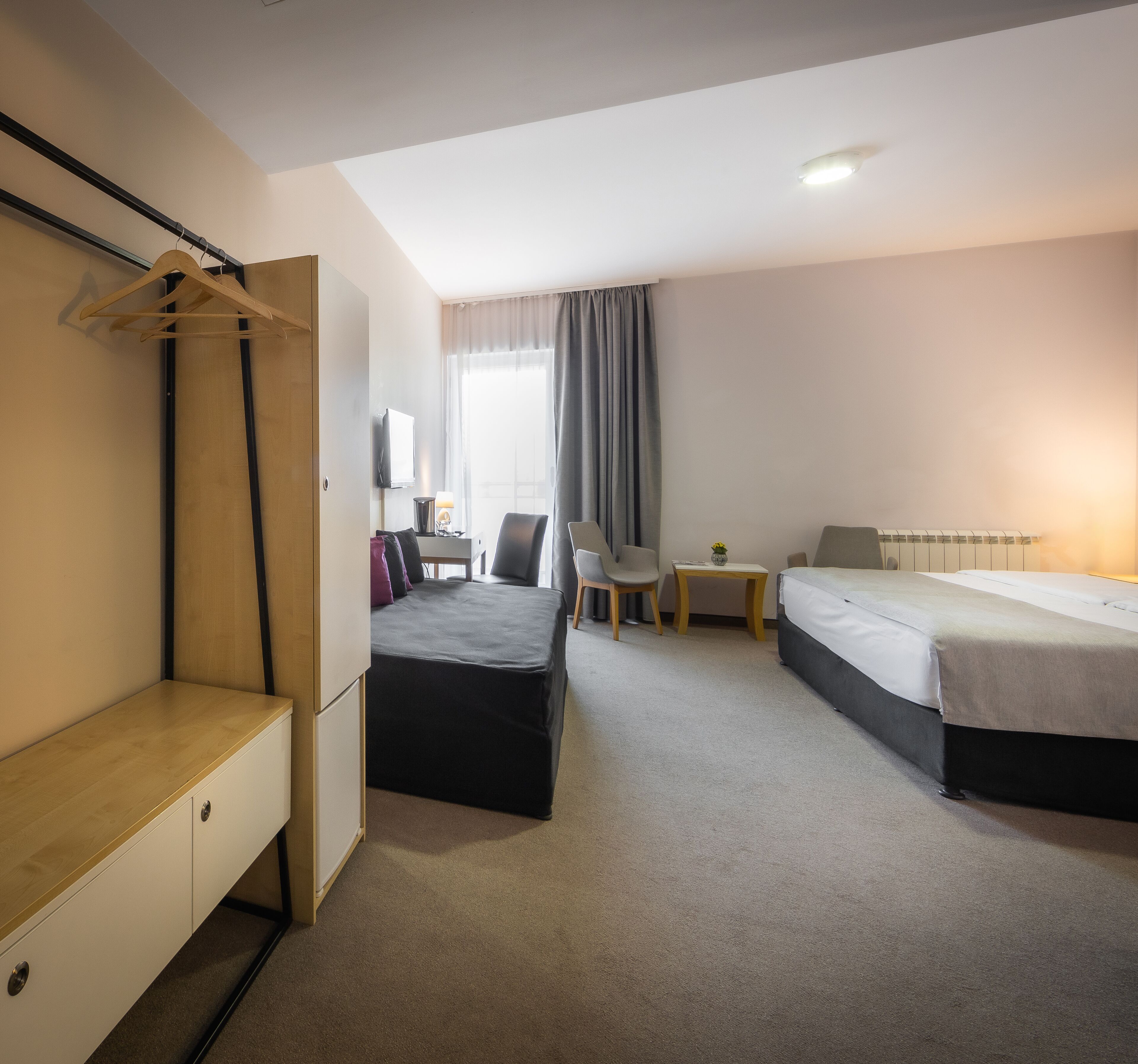 superior triple room | minibar, in-room safe, desk, blackout curtains