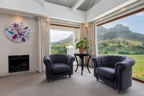 Junior-Suite, 1 King-Bett | Wohnbereich