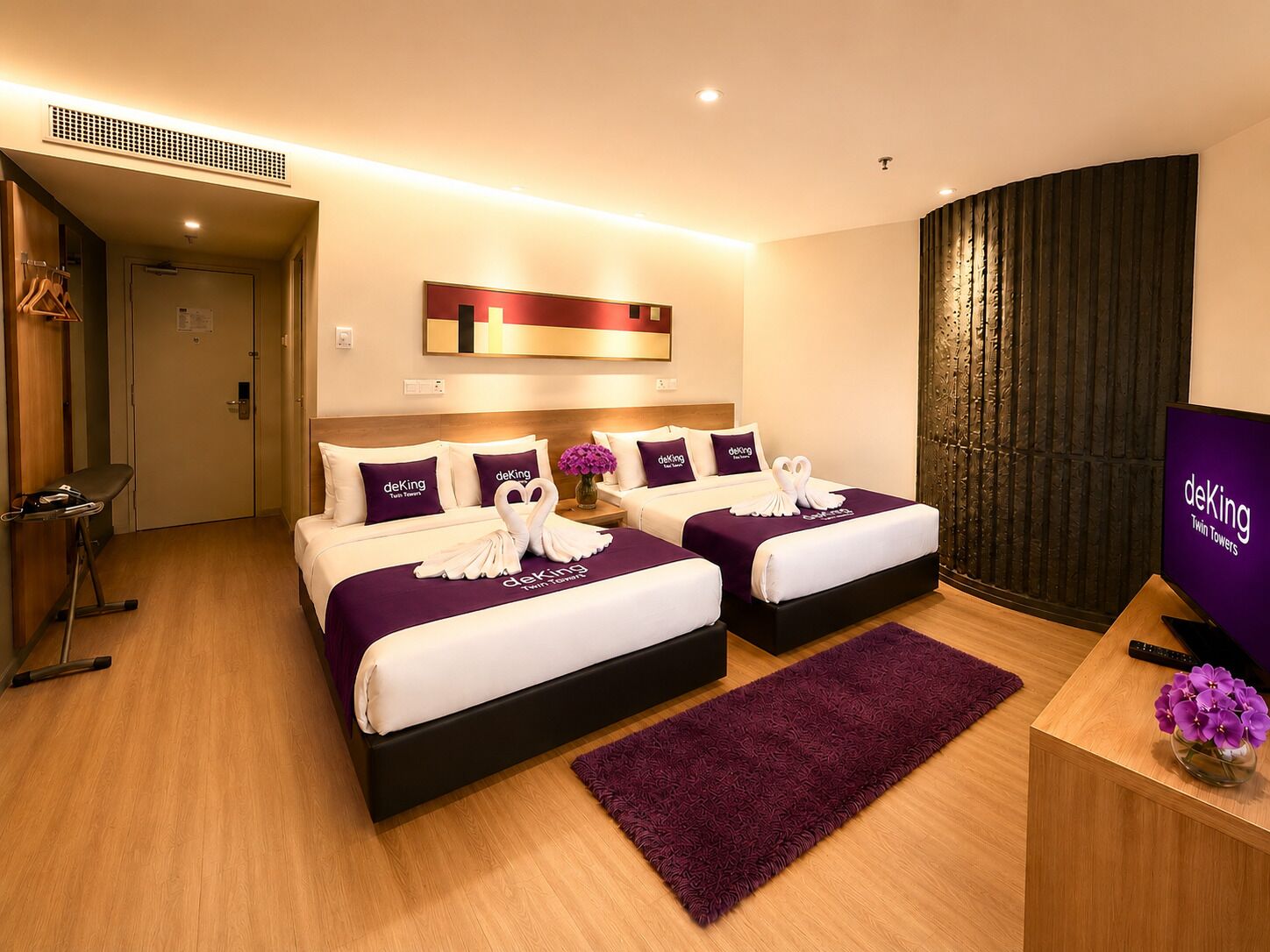 Deluxe Quadruple Room | Minibar, in-room safe, desk, iron/ironing board