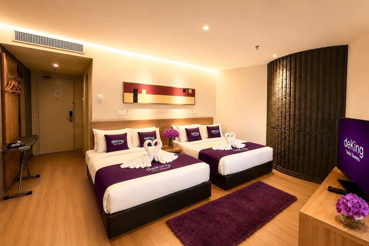 Deluxe Family - City View | Minibar, in-room safe, desk, laptop workspace