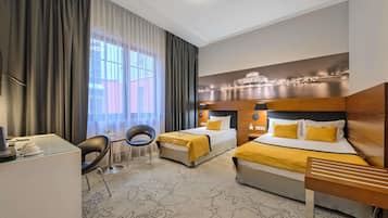 Ropa de cama de alta calidad y minibar