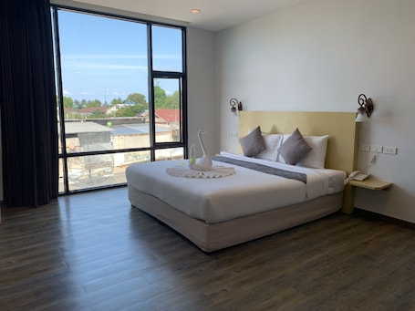 In-room safe, blackout curtains, bed sheets