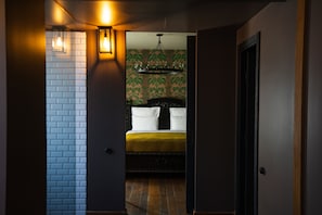 Suite, Garden View | Premium bedding, minibar, in-room safe, individually decorated