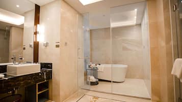 Suite, 1 King Bed, Smoking | Bathroom | Shower, free toiletries, hair dryer, bathrobes