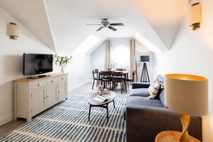 Two Bedroom Apartment (Sofa Bed) | Living room | 32-inch flat-screen TV with satellite channels, TV