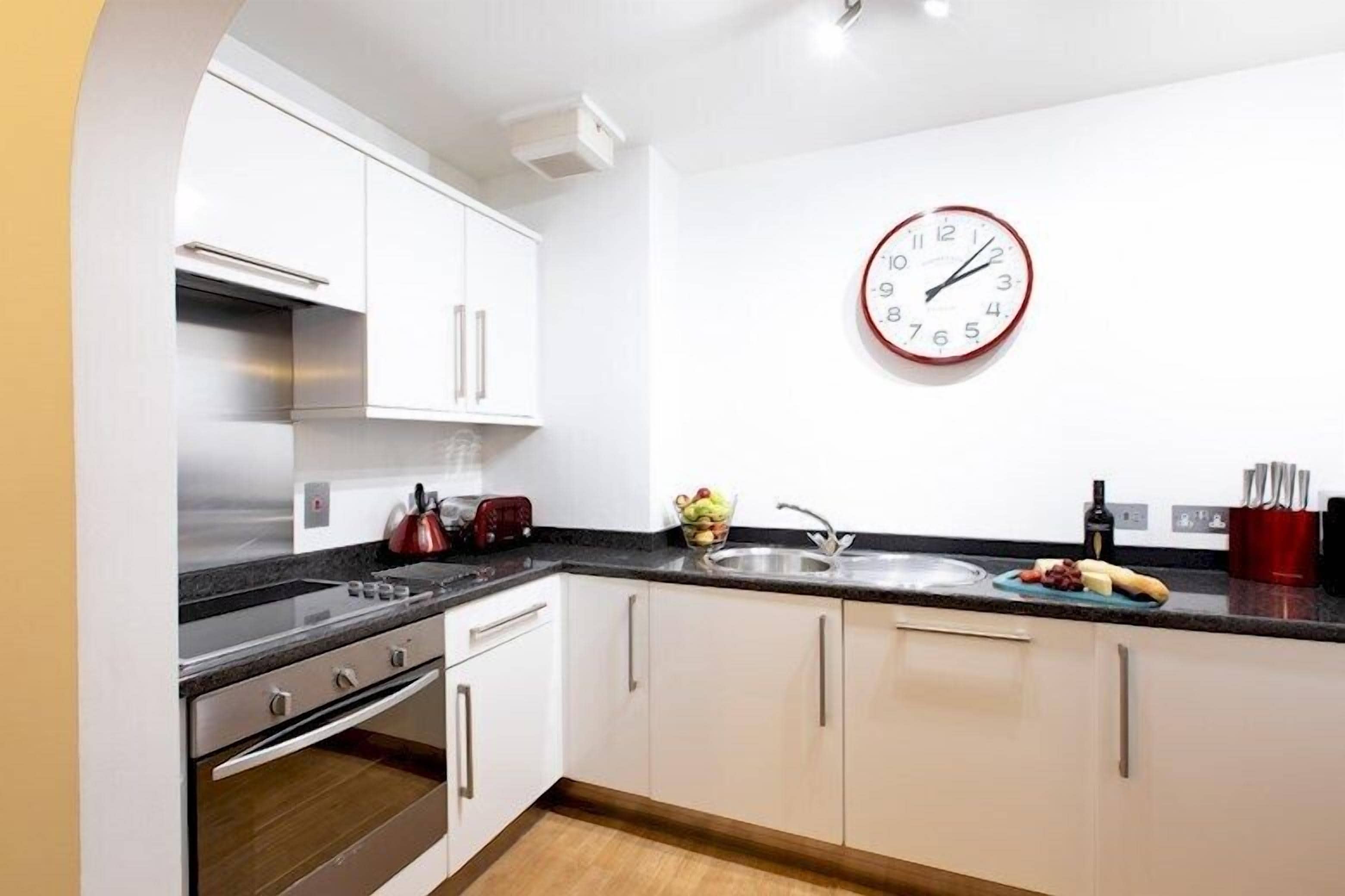 Two Bedroom Apartment | Private kitchen | Full-sized fridge, microwave, oven, stovetop