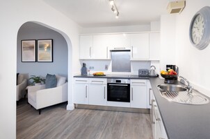 Two Bedroom Apartment (Sofa Bed) | Private kitchen | Full-size fridge, microwave, oven, stovetop