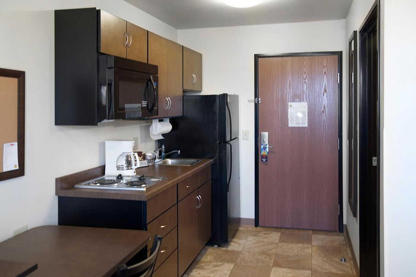 Full-size fridge, microwave, stovetop, toaster