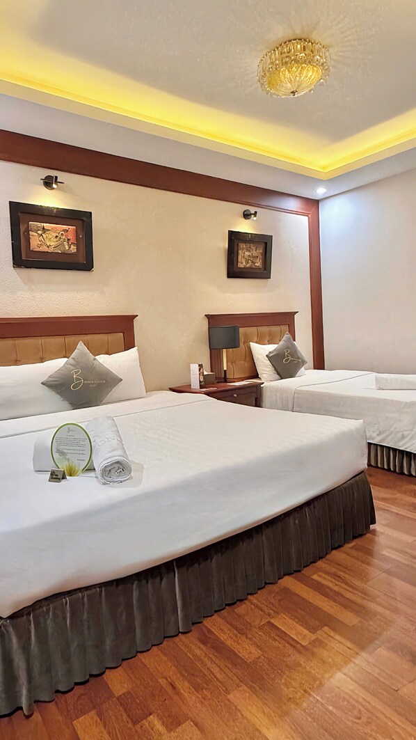 Family Triple Room | Minibar, desk, laptop workspace, soundproofing - Bonjour D'An Nam Home (Hanoi)