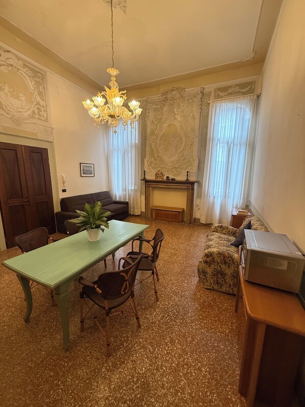 Apartment, 1 Bedroom, Canal View (Cannaregio - Fondamenta Misericordia) | Living area | 32-inch flat-screen TV with digital channels - Apartments Venice (Venice)