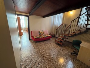 Apartment, 2 Bedrooms, Canal View (Cannaregio - Fondamenta Misericordia) | Living area | 32-inch flat-screen TV with digital channels