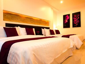 Deluxe Room | Premium bedding, in-room safe, blackout drapes, rollaway beds