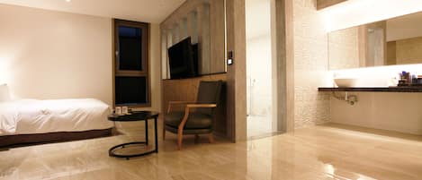 Premium bedding, down comforters, desk, laptop workspace