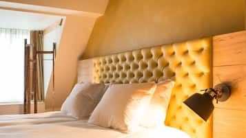 Roupas de cama premium, edredons de pluma, cofres nos quartos