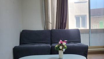 Family Room | Living area | 20-inch TV with cable channels, heated floors