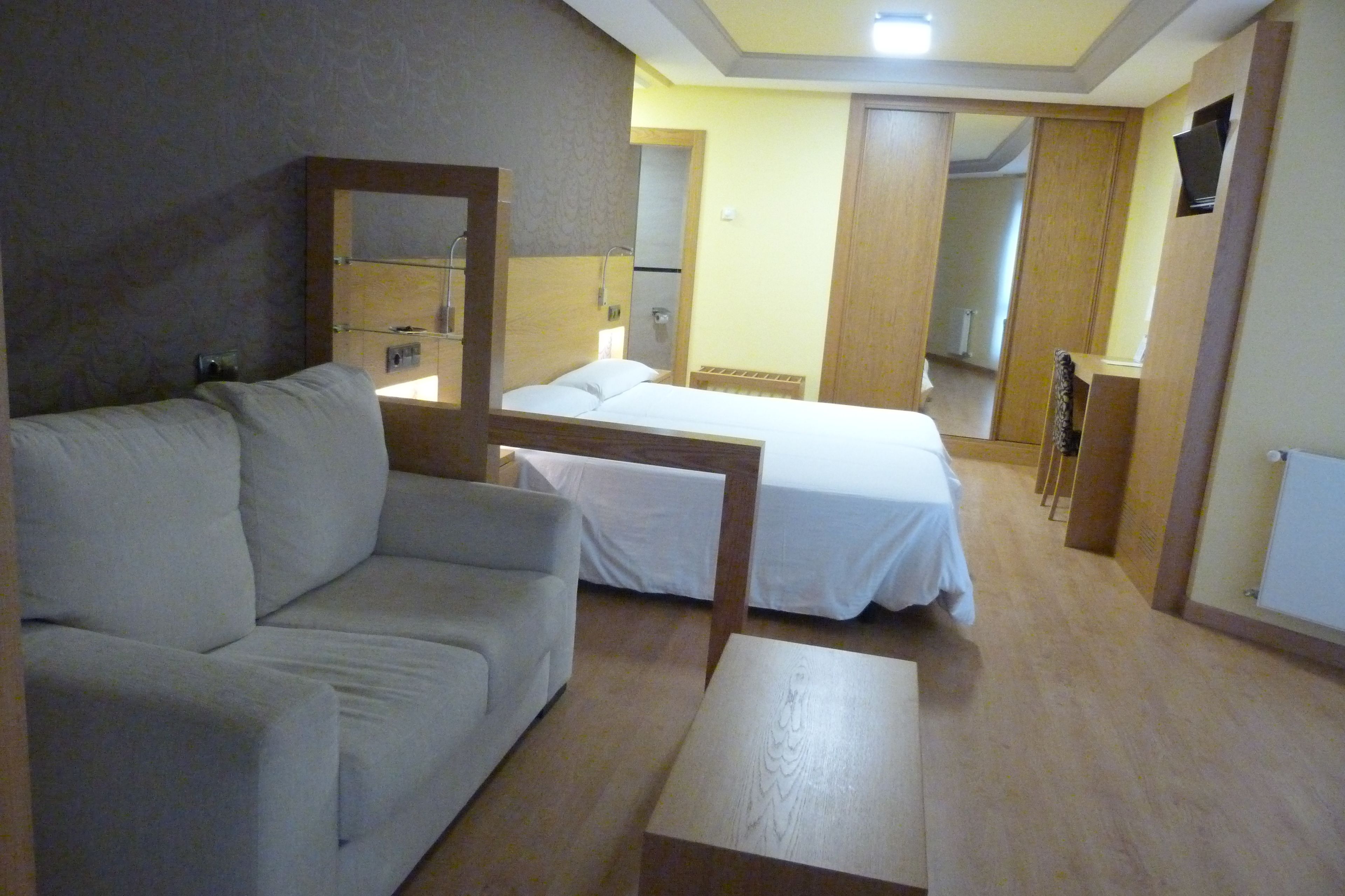 junior suite | minibar, in-room safe, desk, blackout curtains