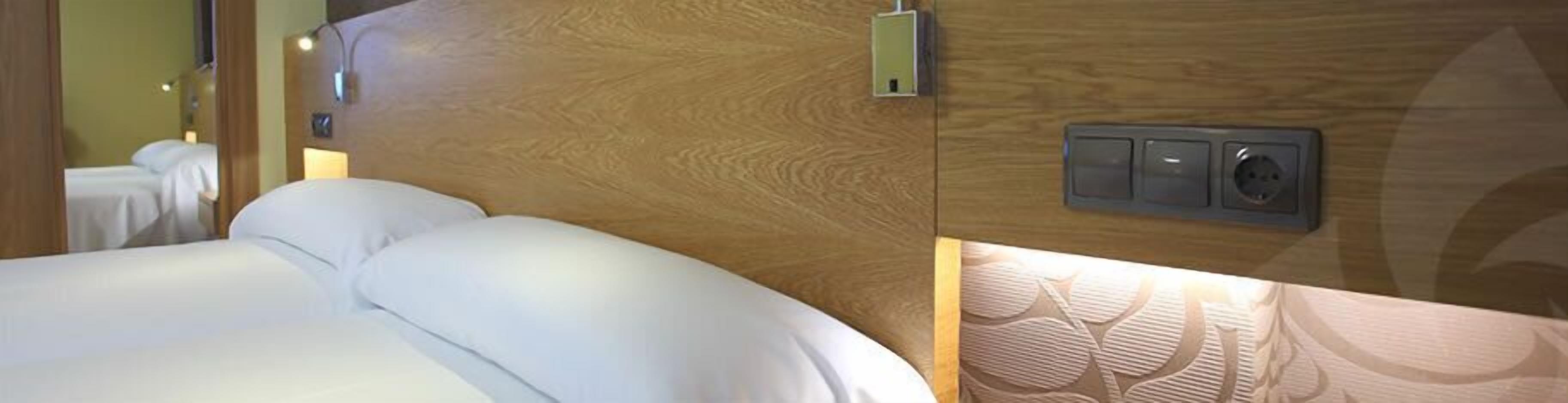 double room, sea view | minibar, in-room safe, desk, blackout curtains