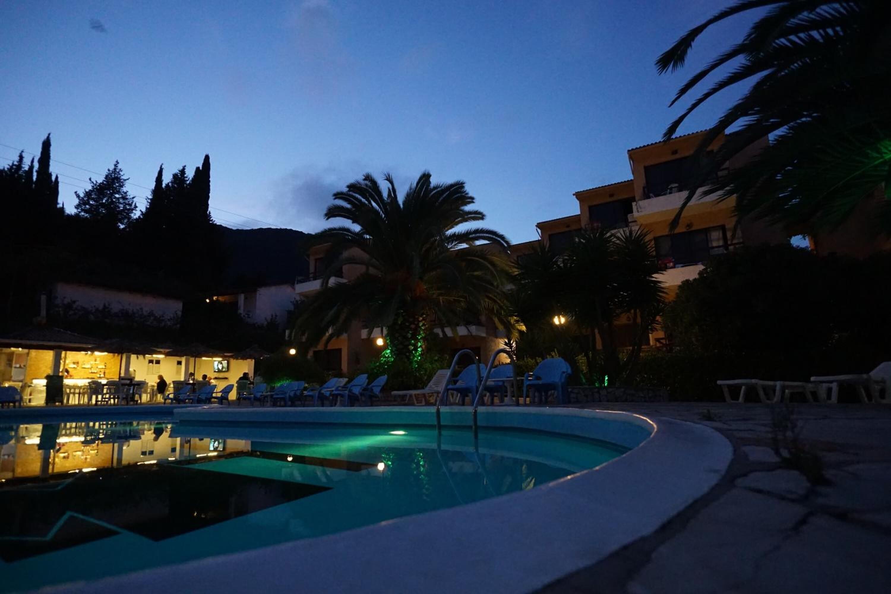 Seasonal outdoor pool, open 9:30 AM to 7:30 PM, pool umbrellas