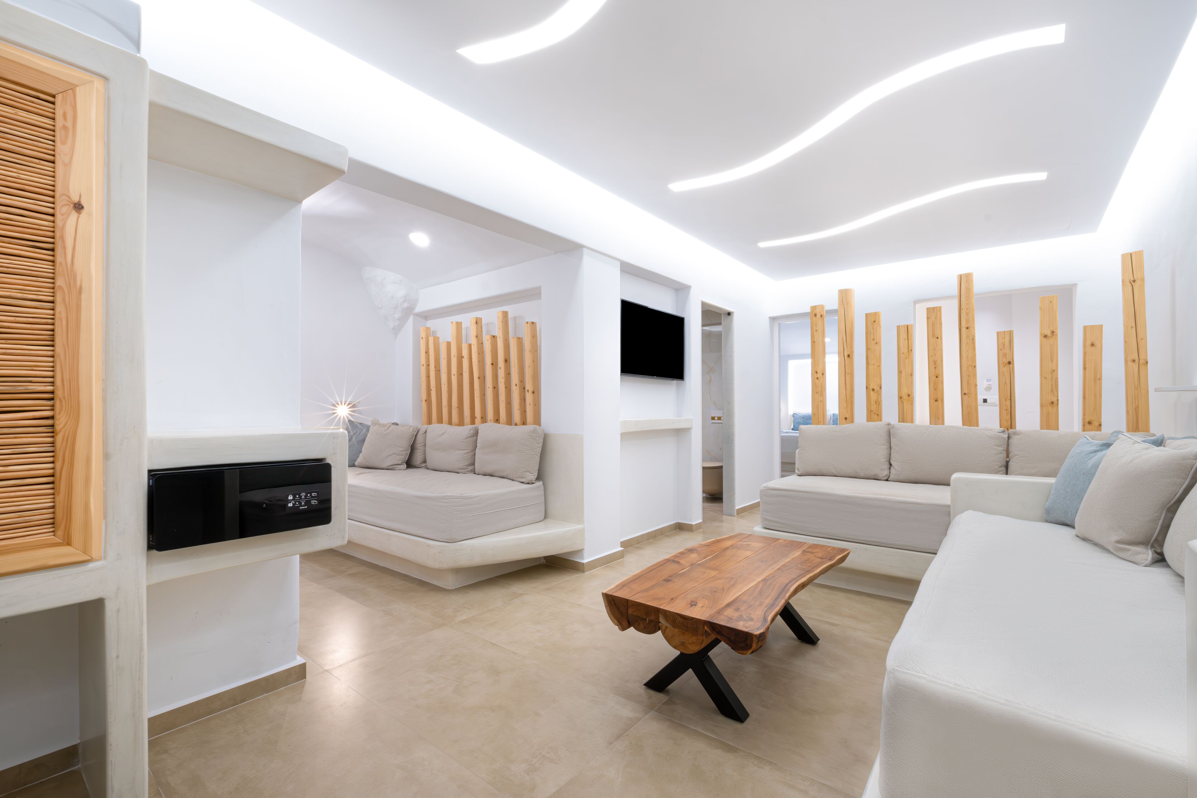 elite suite, hot tub, sea view | living area | lcd tv