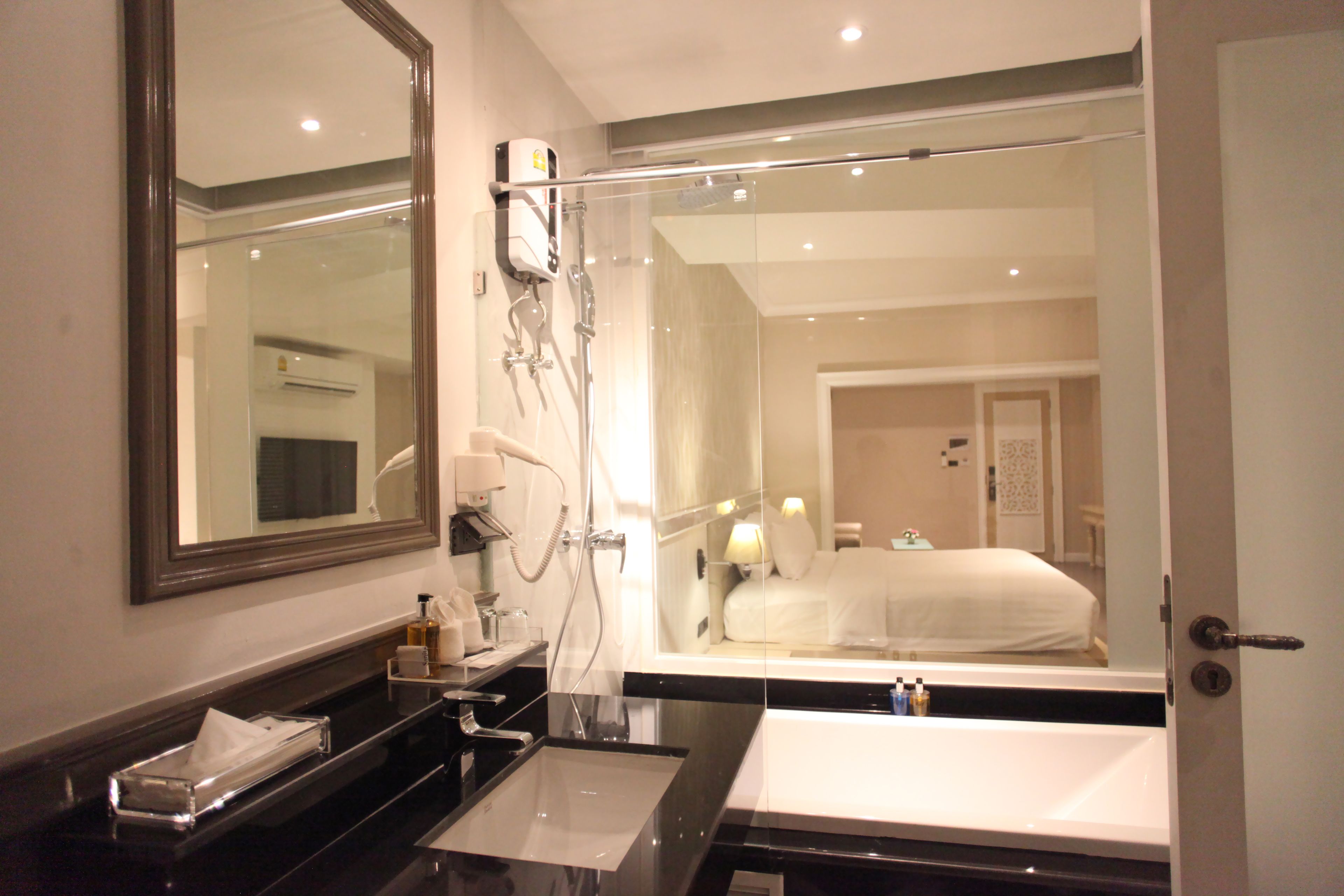 grand deluxe with bathtub | bathroom | free toiletries, hair dryer, slippers, towels