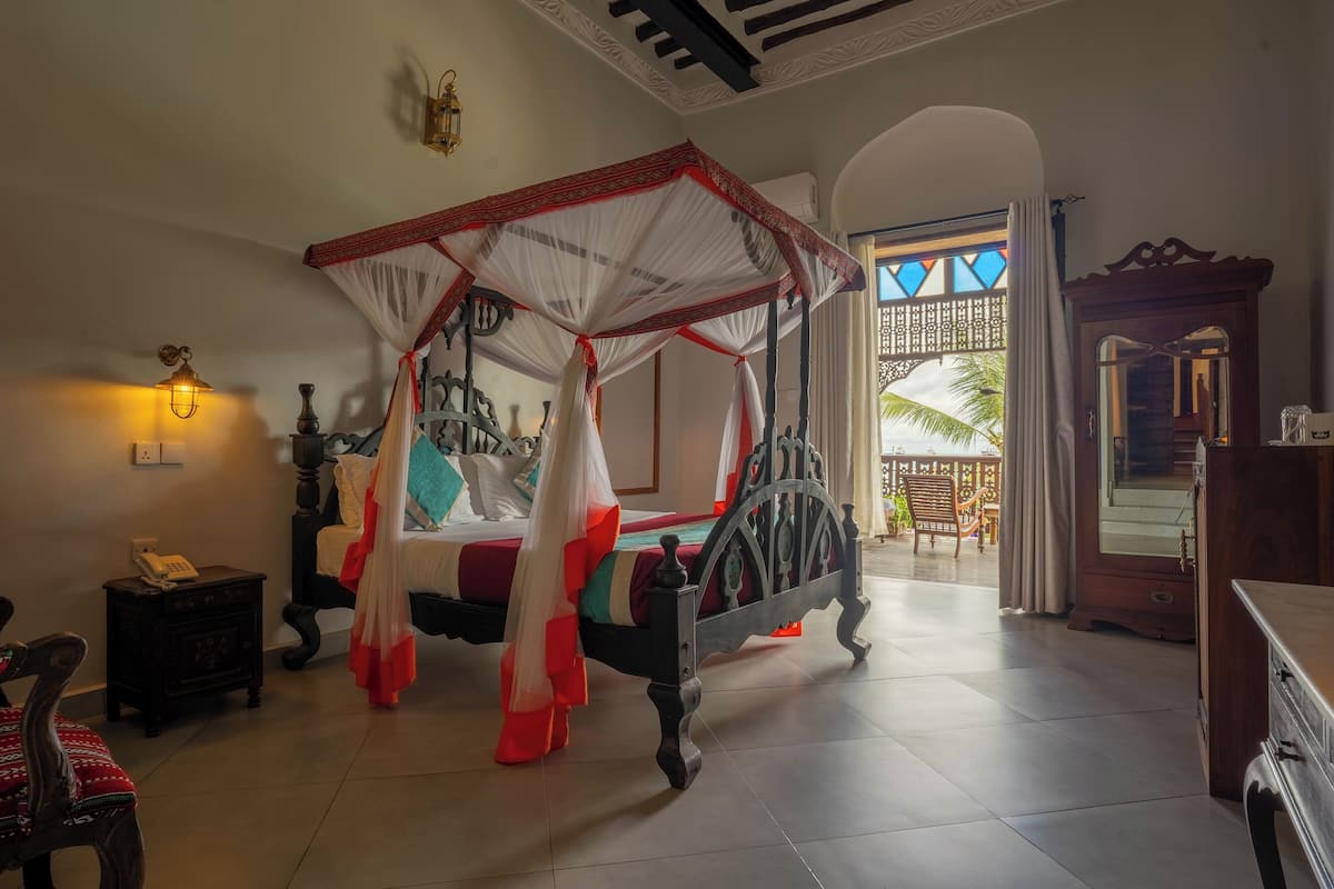Executive Suite, Sea view | 1 bedroom, premium bedding, minibar, in-room safe