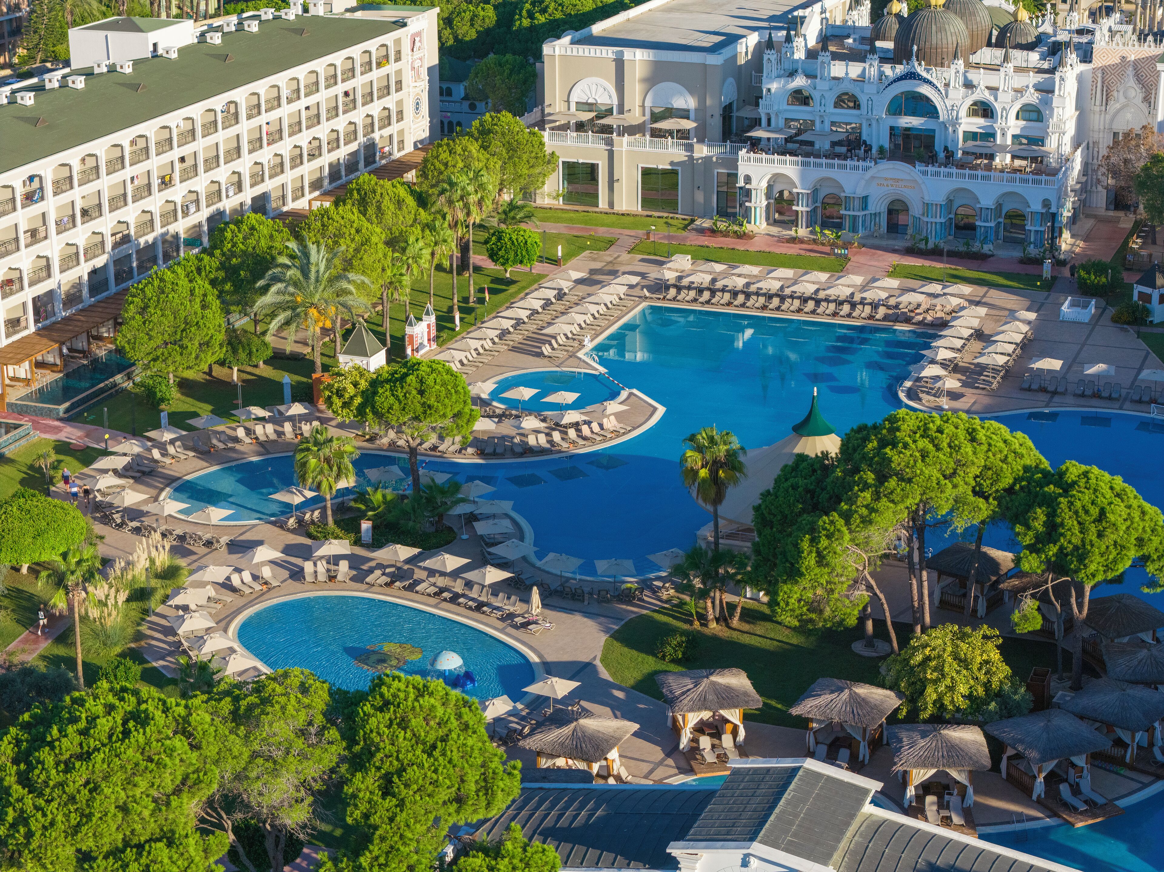 2 outdoor pools, pool umbrellas, pool loungers